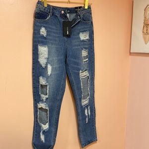 NWT blue denim size large ripped  jeans -